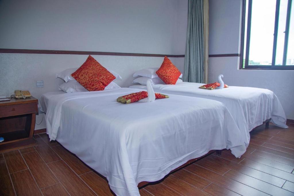 Grand Metro Park Bay Hotel Szanja Kültér fotó